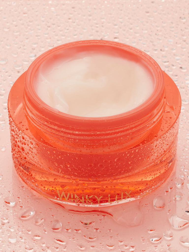 dream gelee face moisturizer with lid off and water droplets surrounding
