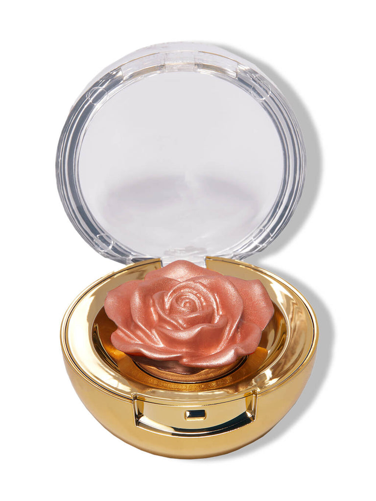 Rosé -- cheeky rose cream highlighter in rose packaging on white background