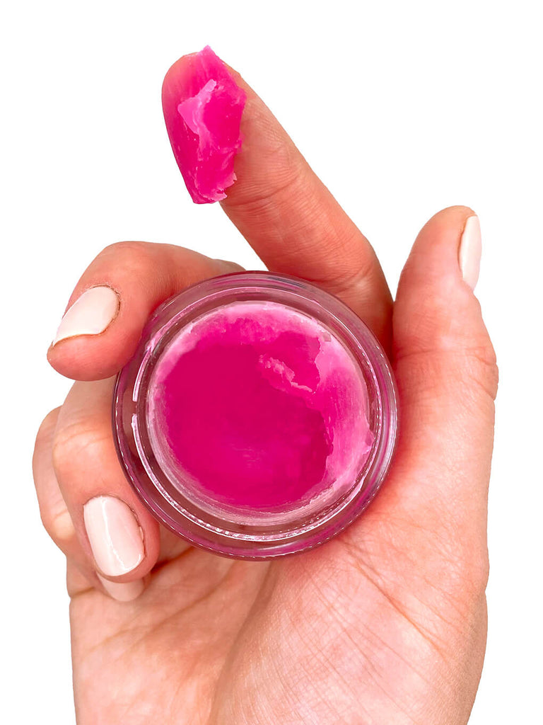 hang holding up translucent jelly bear hydrating face primer with goop on finger
