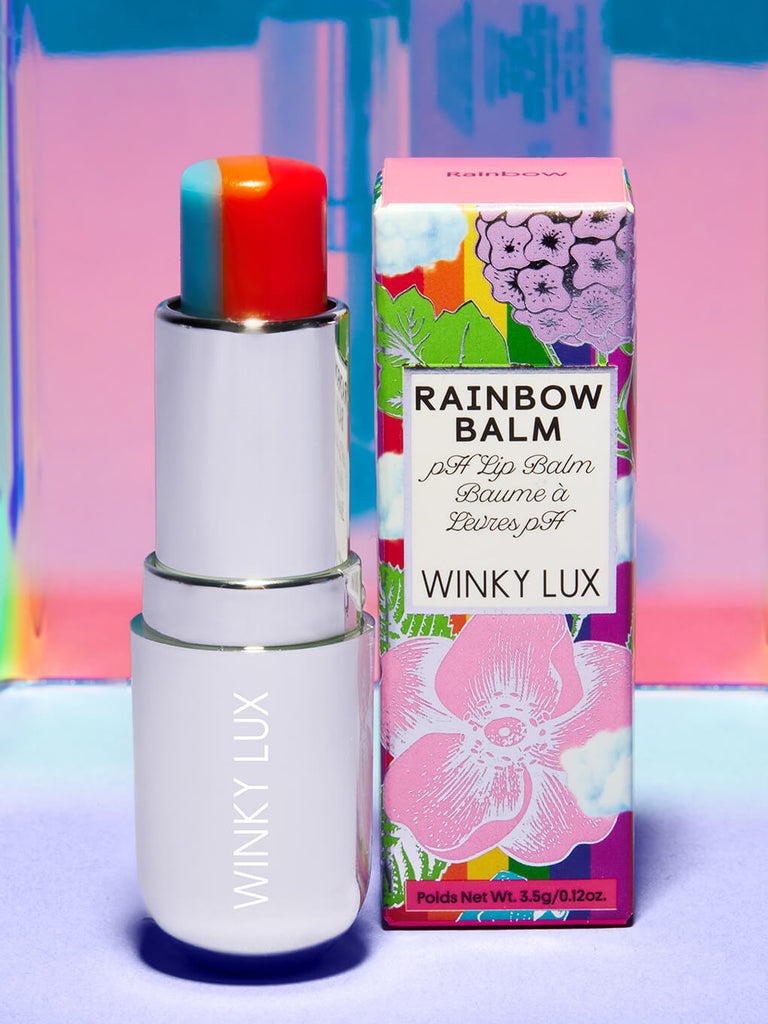 rainbow tinted ph lip balm next to box