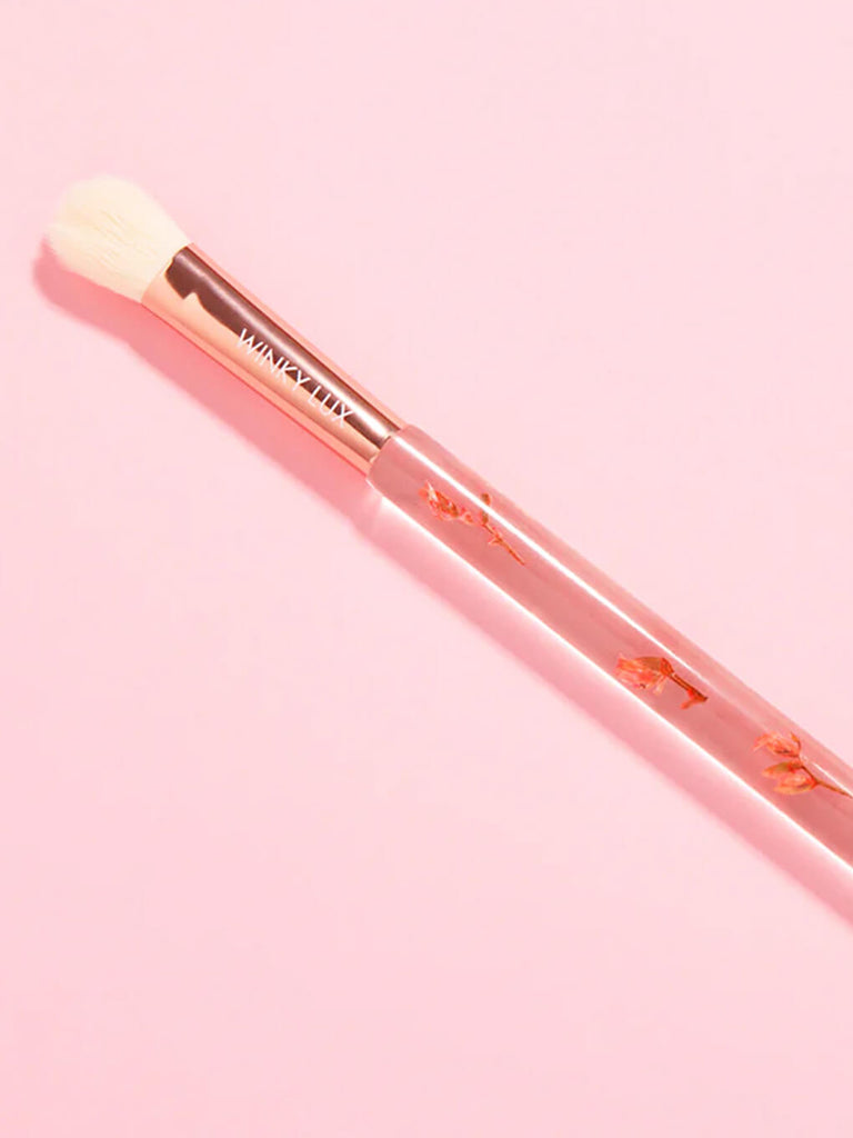 forever flower small makeup brush on pink background