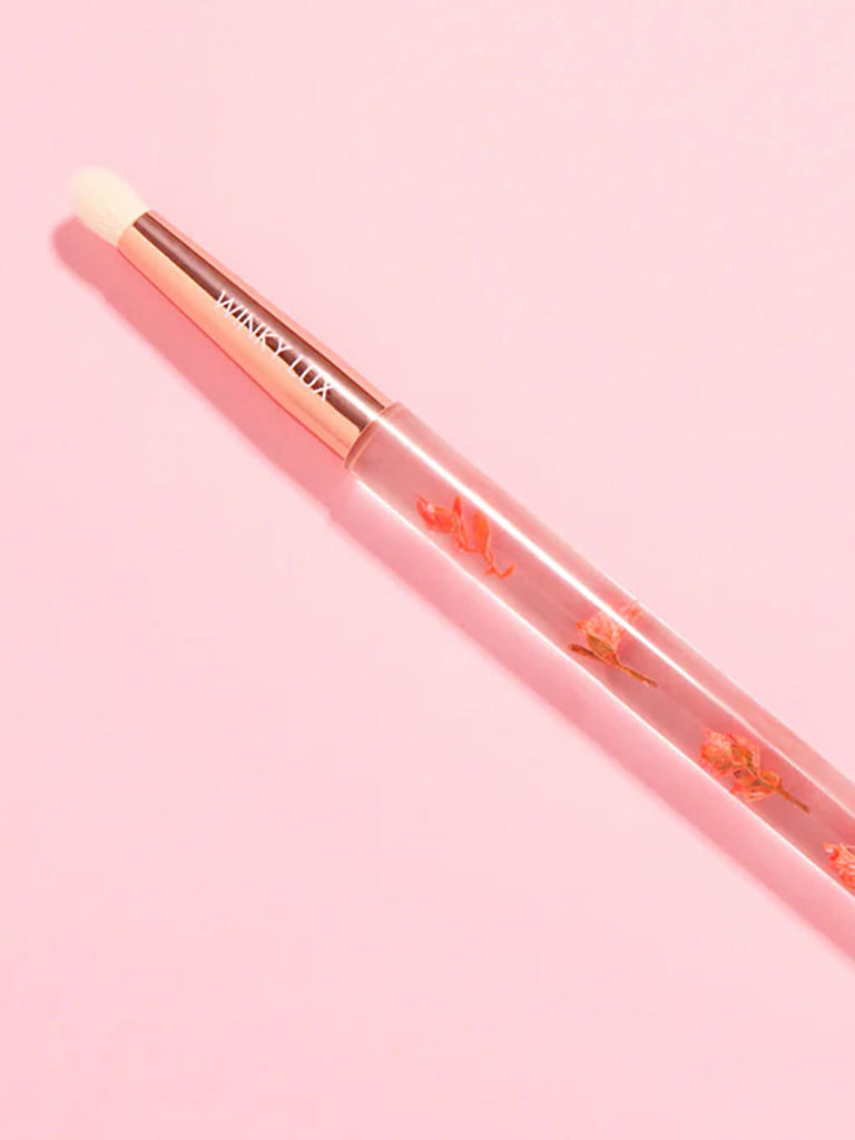 forever flower eyeshadow smallest makeup brush on pink background