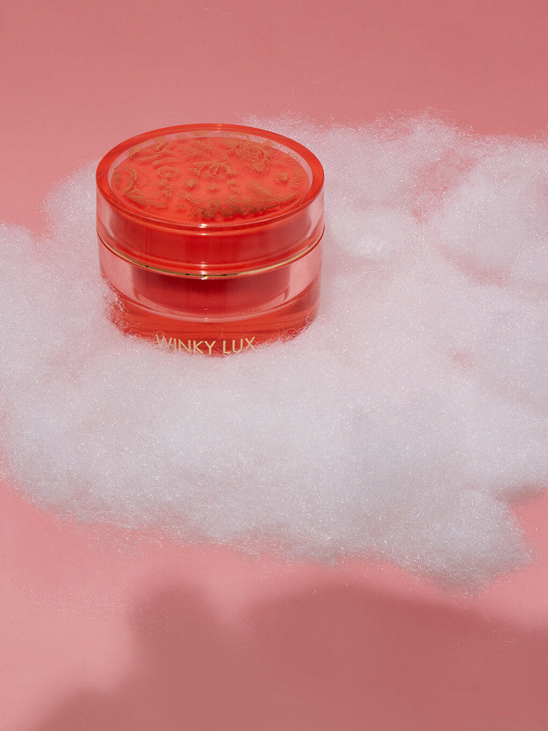 dream gelee face moisturizer on white cloud on pink background