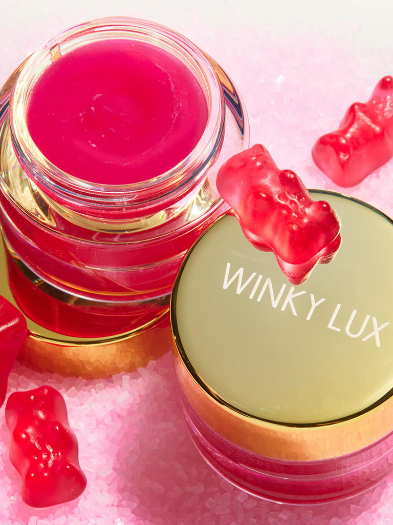 jelly bear hydrating face primer with lid open and pink gummy bears surrounding