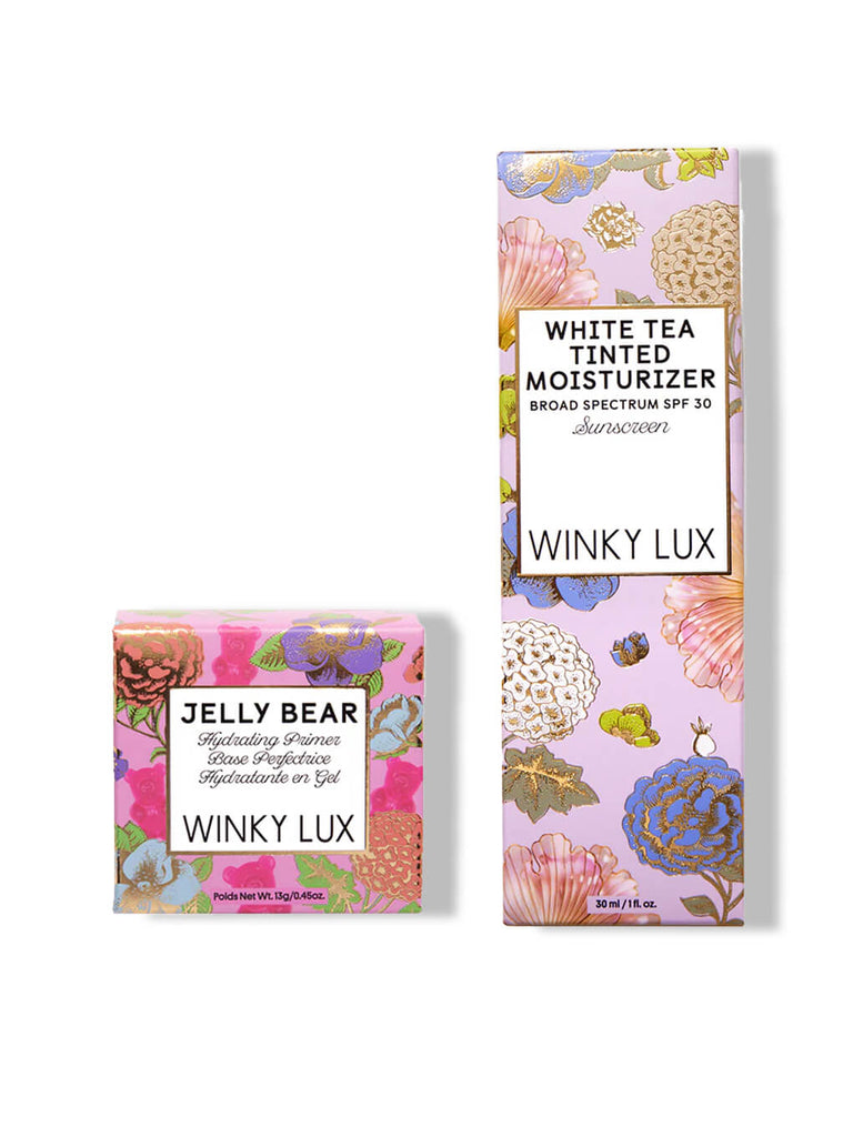 white tea tinted moisturizer and jelly bear hydrating primer in boxes on white background