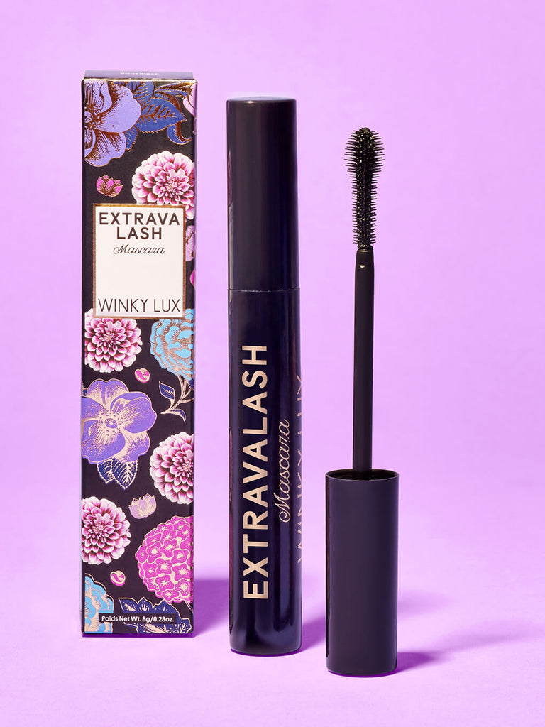 extravalash mascara and box standing with purple background
