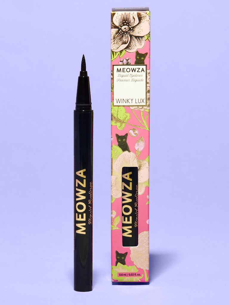 meowza liquid eyeliner and box standing with purple background