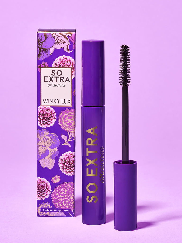 so extra volumizing mascara and box standing on purple background 