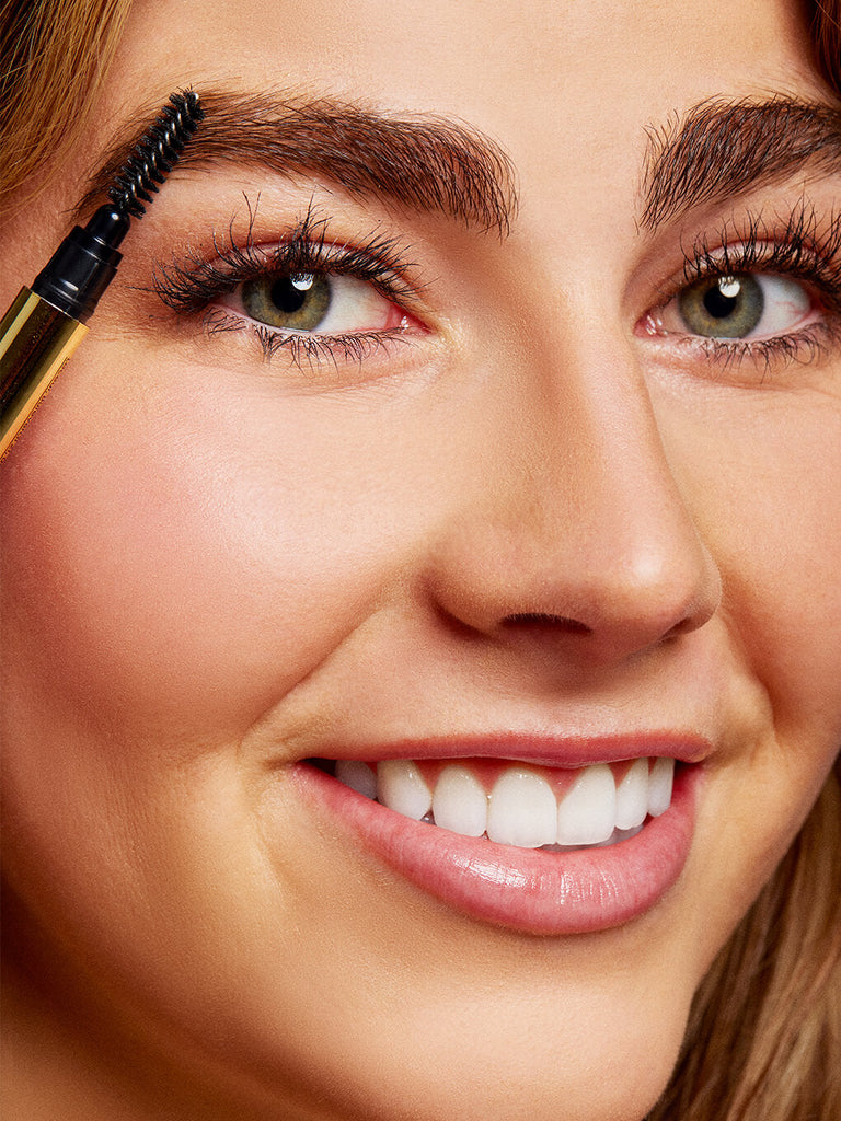 close up of unibrow universal brow pencil applied to models eyebrow