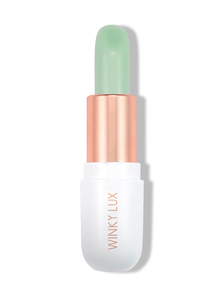 clear -- matcha lip balm on white background