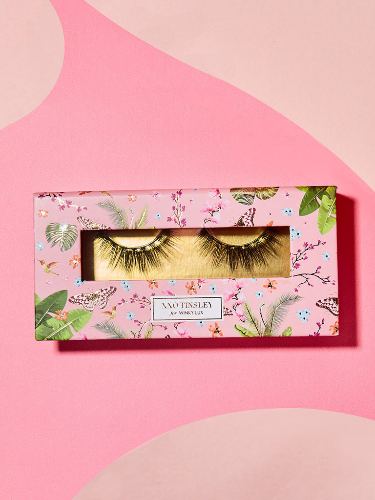 babydoll -- fake eyelashes in box flat lay on pink background